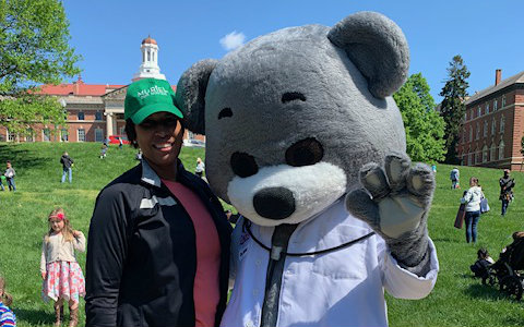 Dr Bear and Mayor Muriel Bowser pose for a photo